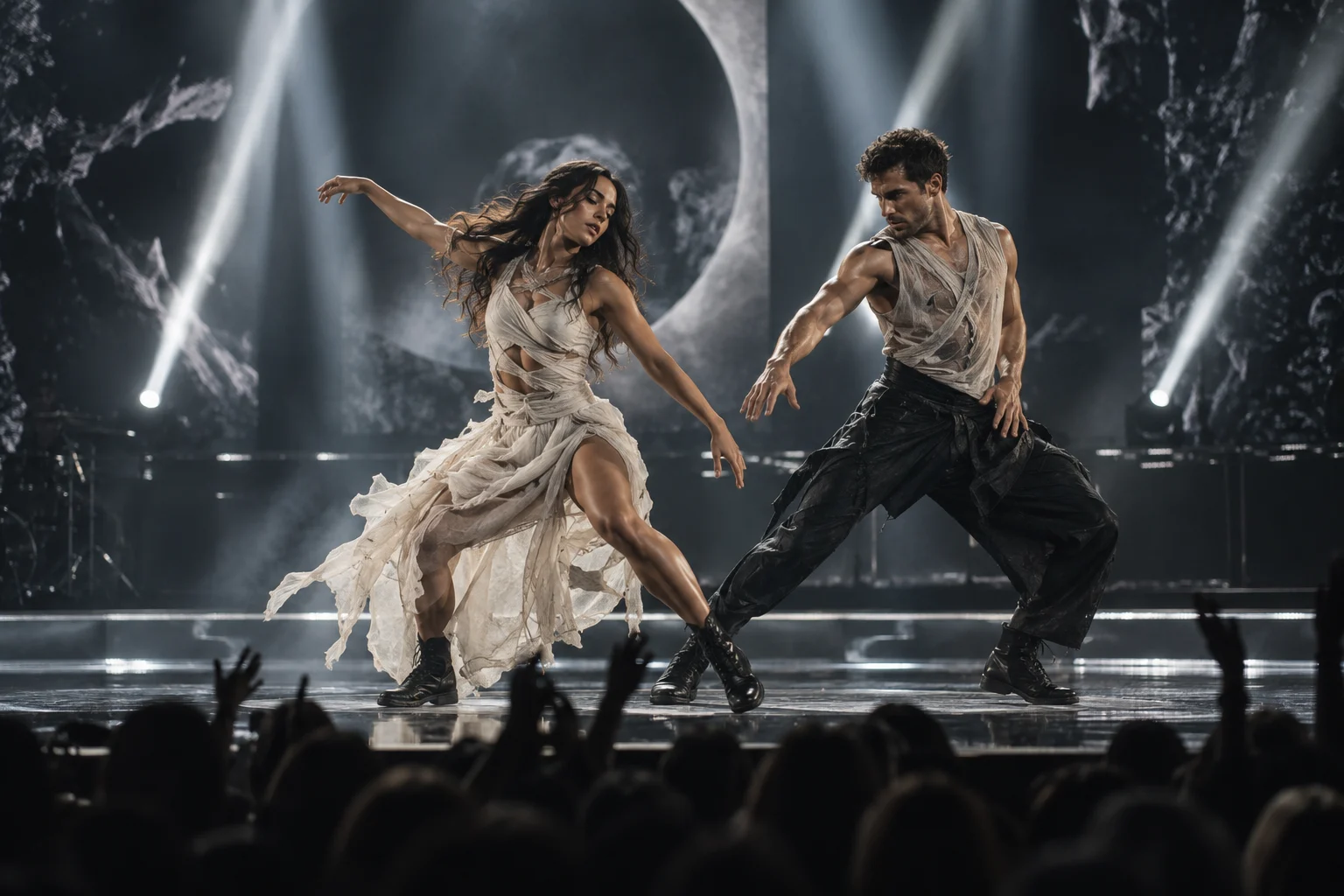 Dancers performing together on a large stage